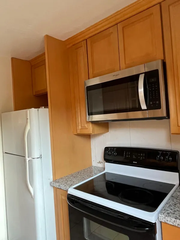 Kitchen before remodeling, with original oak cabinets, in Vallejo