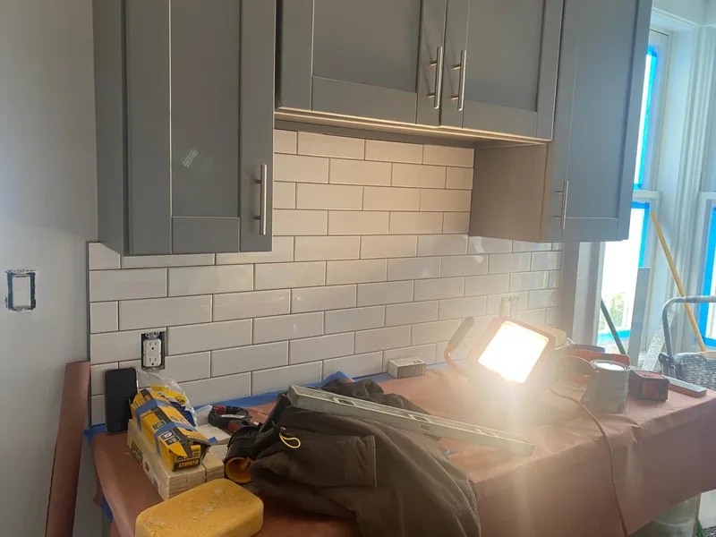 Gray shaker cabinets and white subway tile in a kitchen remodel in Vallejo