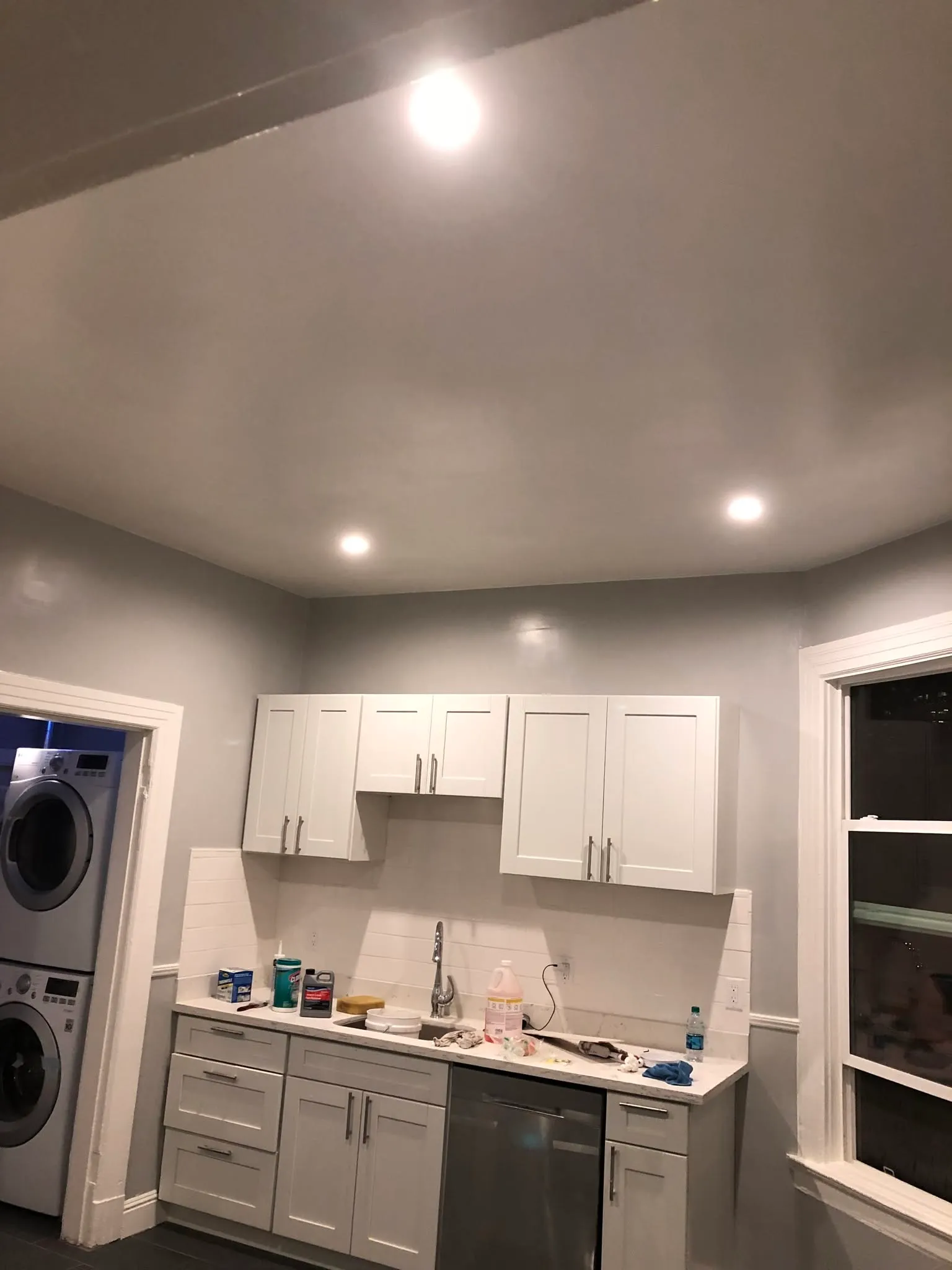White cabinets and laundry nook in a kitchen remodel in Vallejo