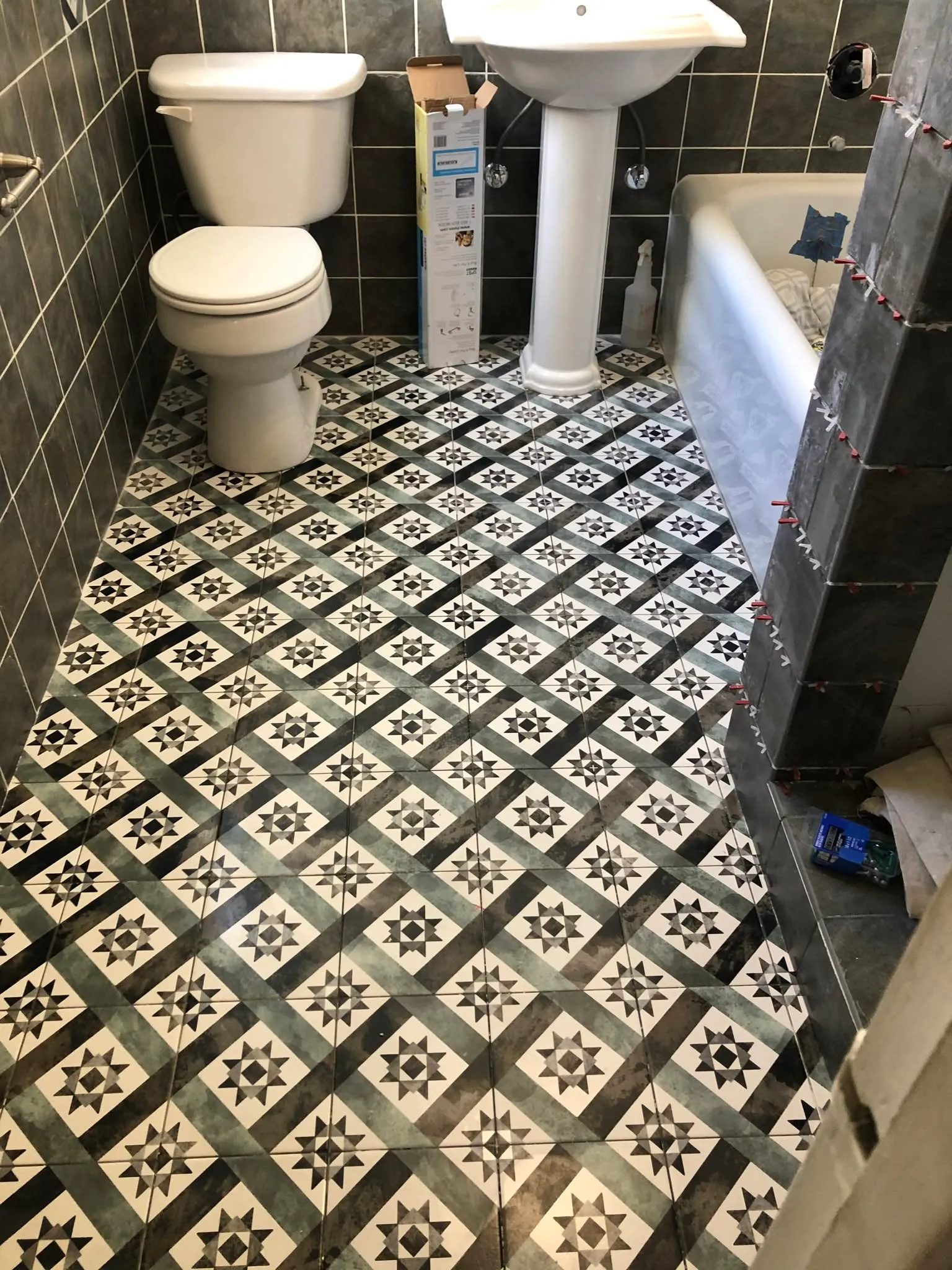 Patterned cement tile bathroom floor installed in Vallejo