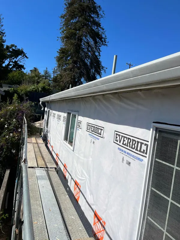 General contracting in Vallejo: exterior siding and window wrap in progress